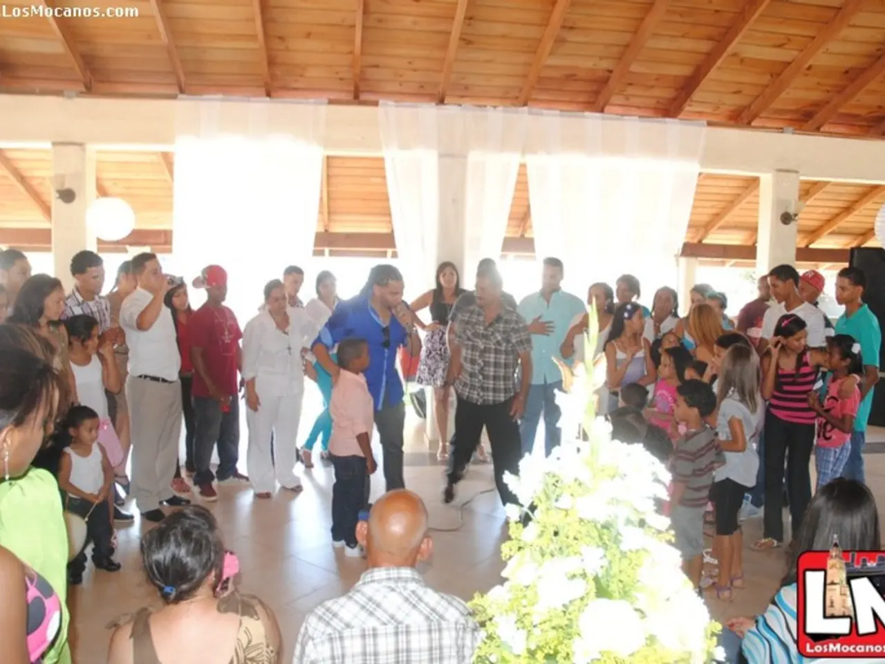 This picture describes about group of people, at the bottom of the image we can find a plant and a...