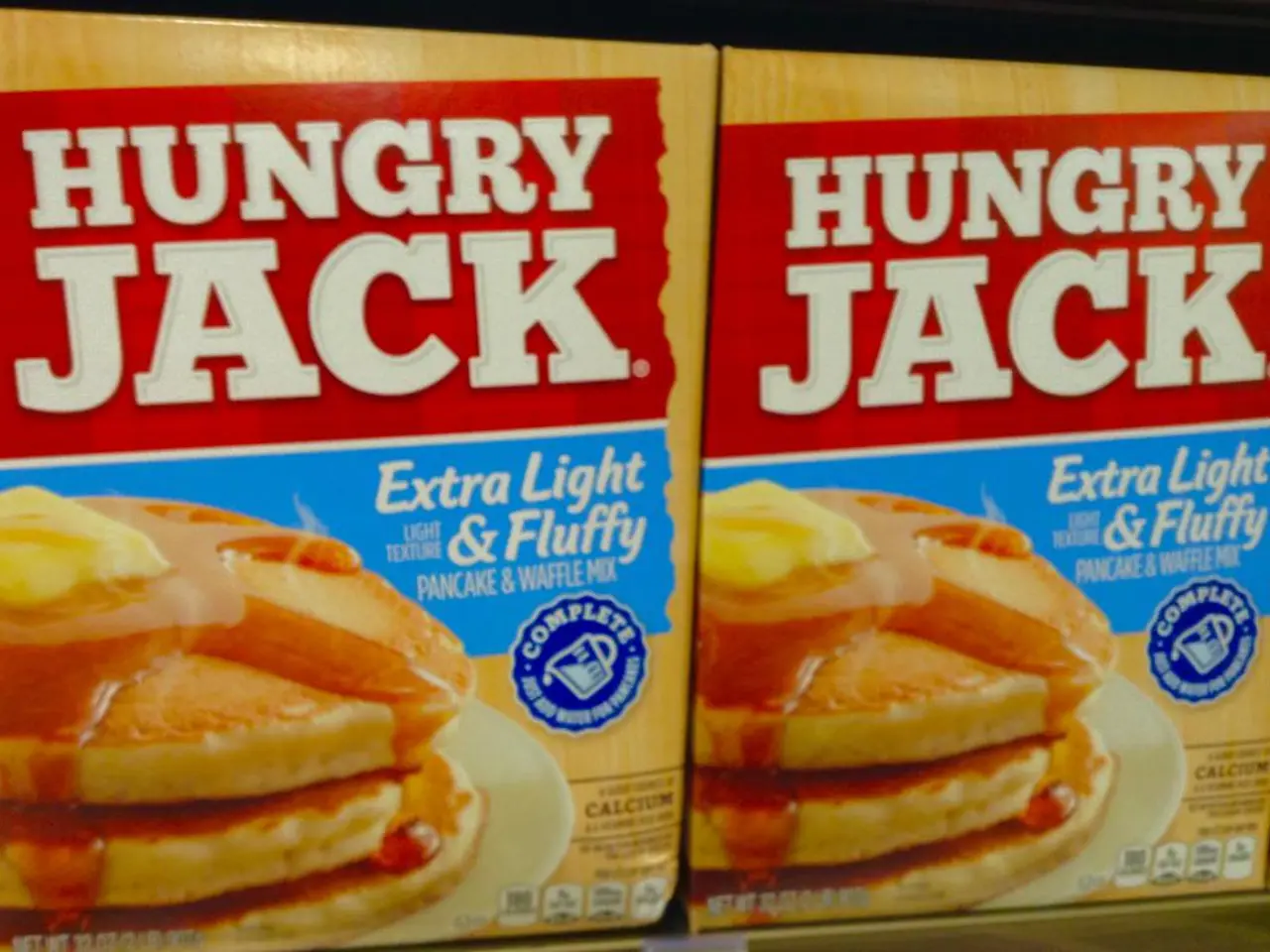 In this image there are two packets, in that packets there is text and logo.